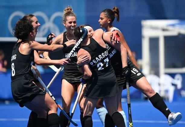 New Zealand's Holly Pearson celebrates with teammates as after scoring against Argentina as Argentina's Valentina Raposo Ruiz De Los Llanos reacts...