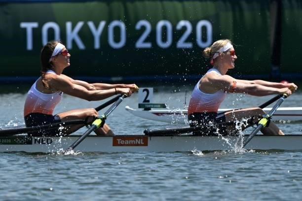 Netherlands' Roos De Jong and Netherlands' Lisa Scheenaard compete in the women's double sculls semi-final during the Tokyo 2020 Olympic Games at the...