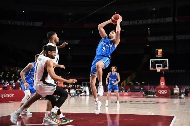 Italy's Danilo Gallinari shoots the ball in the men's preliminary round group B basketball match between Germany and Italy during the Tokyo 2020...