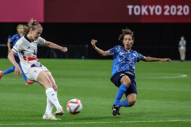 Emi NAKAJIMA of Team Japan is challenged by Keira WALSH of Team Great Britain during the Women's First Round Group E match between Japan and Great...