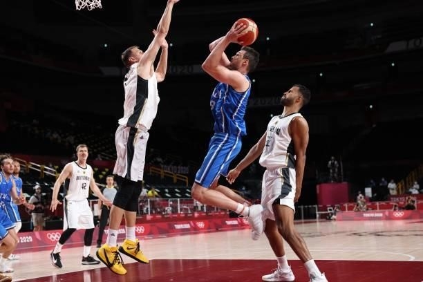 Italy's Danilo Gallinari shoots the ball in the men's preliminary round group B basketball match between Germany and Italy during the Tokyo 2020...