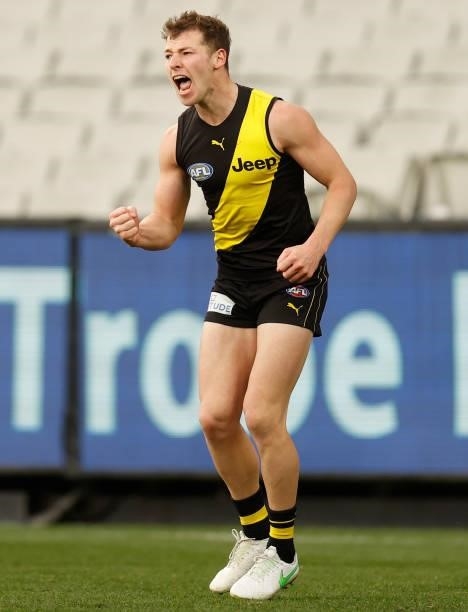 Jake Aarts of the Tigers celebrates a goal during the 2021 AFL Round 19 match between the Geelong Cats and the Richmond Tigers at the Melbourne...