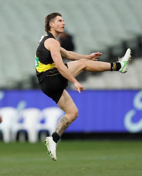 Liam Baker of the Tigers in action during the 2021 AFL Round 19 match between the Geelong Cats and the Richmond Tigers at the Melbourne Cricket...