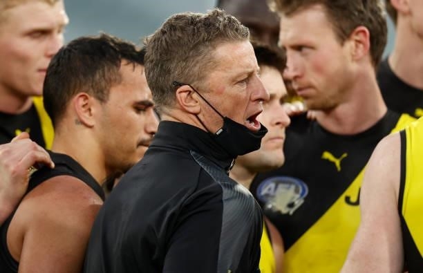 Damien Hardwick, Senior Coach of the Tigers looks on during the 2021 AFL Round 19 match between the Geelong Cats and the Richmond Tigers at the...