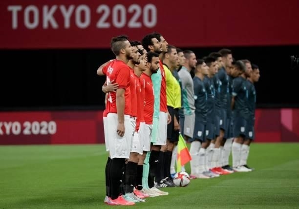 Egypt and Argentina players make a queue prior to their Tokyo 2020 Olympic Games men's group C first round football match between Egypt and Argentina...