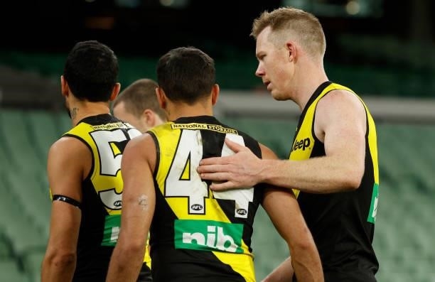 Sydney Stack and Jack Riewoldt of the Tigers look dejected after a loss during the 2021 AFL Round 19 match between the Geelong Cats and the Richmond...