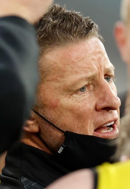 Damien Hardwick, Senior Coach of the Tigers looks on during the 2021 AFL Round 19 match between the Geelong Cats and the Richmond Tigers at the...