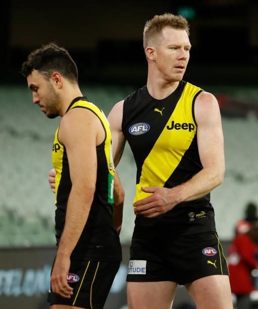 Shane Edwards and Jack Riewoldt of the Tigers look dejected after a loss during the 2021 AFL Round 19 match between the Geelong Cats and the Richmond...