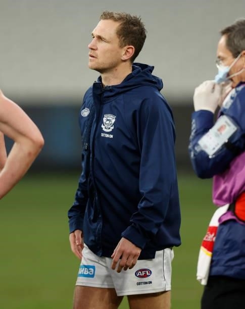 Joel Selwood of the Cats looks on after being subbed from the match during the 2021 AFL Round 19 match between the Geelong Cats and the Richmond...