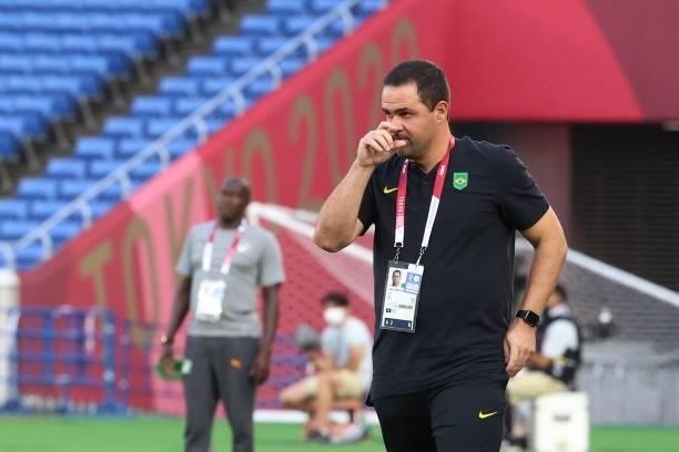 Brazil's coach Andre Jardine looks on from the touchline during the Tokyo 2020 Olympic Games men's group D first round football match between Brazil...