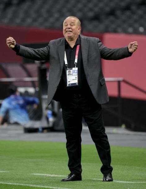 Egypt's coach Shawky Gharib instructs his players during the Tokyo 2020 Olympic Games men's group C first round football match between Egypt and...