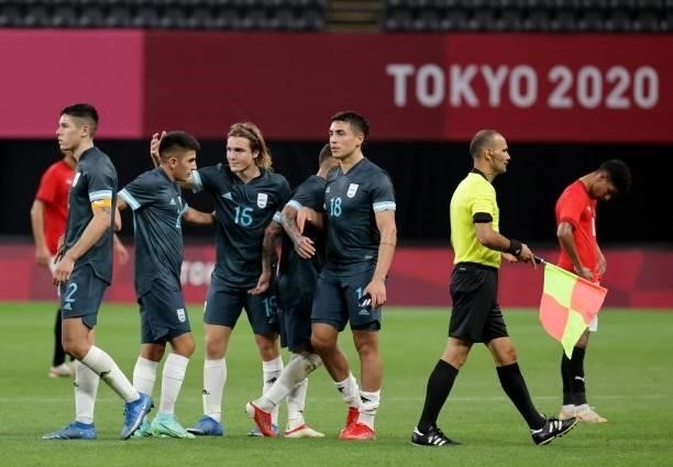 Argentina's forward Pedro De La Vega celebrates team's victory with teammates during the Tokyo 2020 Olympic Games men's group C first round football...