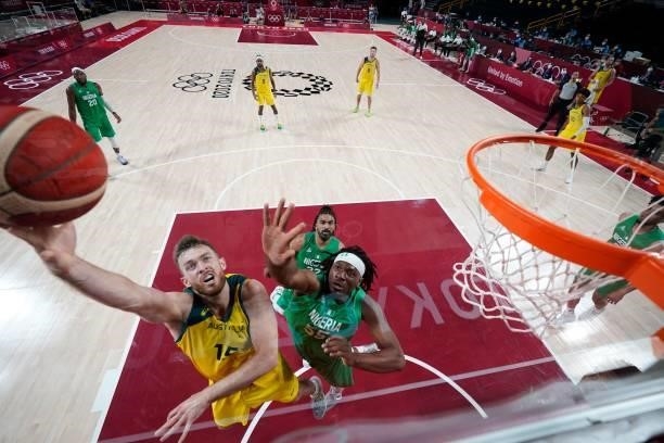 Australia's Nic Kay goes to the basket in the men's preliminary round group B basketball match between Australia and Nigeria during the Tokyo 2020...