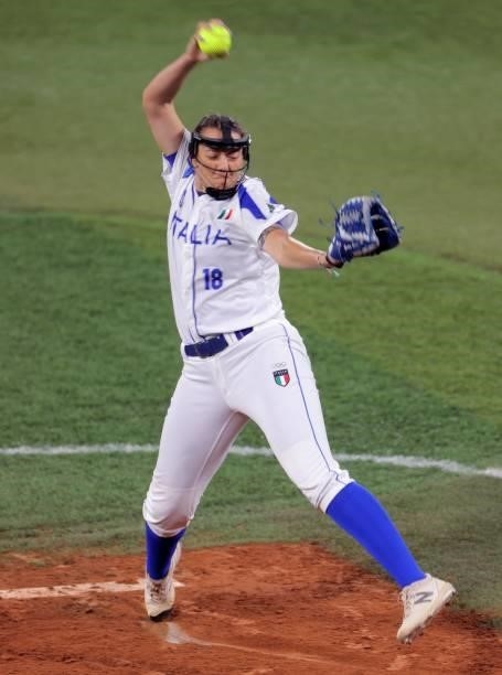 Italy's starter Greta Cecchetti hurls the ball during the second inning of the Tokyo 2020 Olympic Games softball opening round game between Italy and...