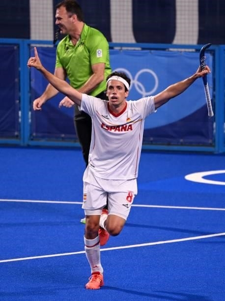 Spain's Enrique Gonzalez celebrates after scoring against New Zealand during their men's pool A match of the Tokyo 2020 Olympic Games field hockey...