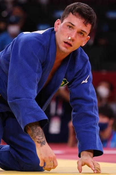 Brazil's Daniel Cargnin reacts while competing with Israel's Baruch Shmailov during their judo men's -66kg bronze medal B bout during the Tokyo 2020...