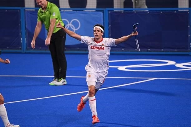 Spain's Enrique Gonzalez celebrates after scoring against New Zealand during their men's pool A match of the Tokyo 2020 Olympic Games field hockey...