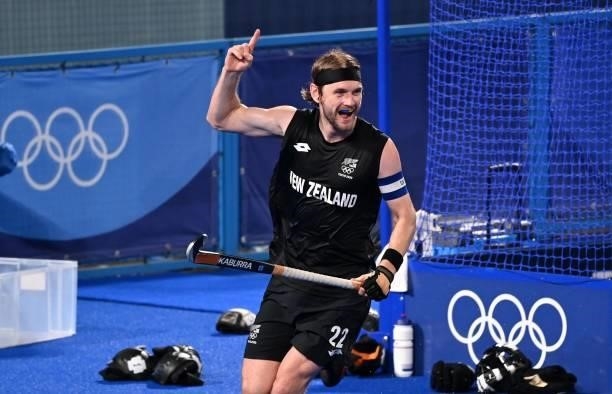 New Zealand's Blair Tarrant celebrates after scoring against Spain during their men's pool A match of the Tokyo 2020 Olympic Games field hockey...