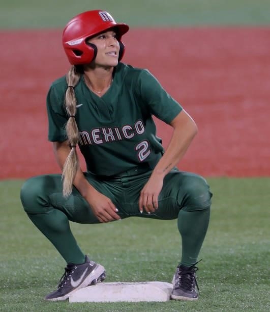 Mexico's Sydney Romero reacts on the second base after tagged out during the fifth inning of the Tokyo 2020 Olympic Games softball opening round game...