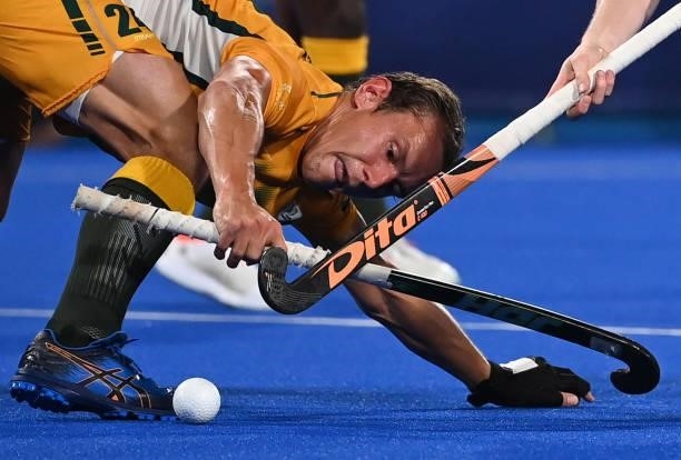 South Africa's Nicholas Balfour Spooner and Netherlands' Severiano Boris Van Ass vie for the ball during their men's pool B match of the Tokyo 2020...