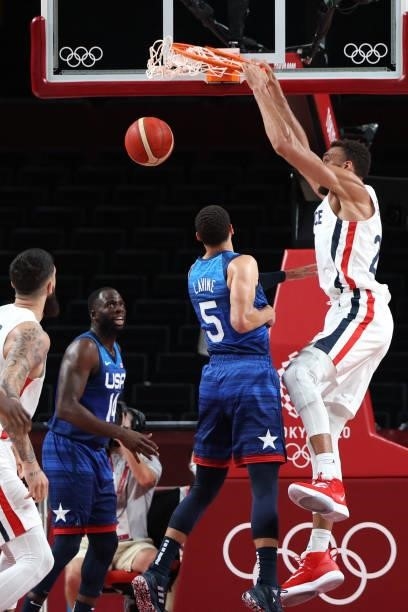 France's Rudy Gobert scores a basket in the men's preliminary round group A basketball match between France and USA during the Tokyo 2020 Olympic...