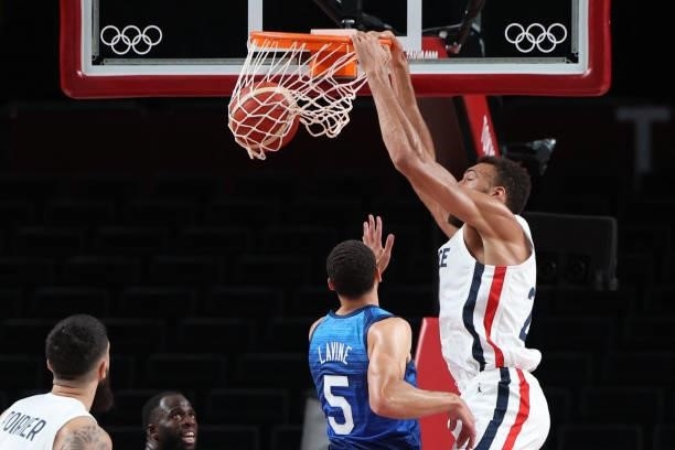 France's Rudy Gobert scores a basket in the men's preliminary round group A basketball match between France and USA during the Tokyo 2020 Olympic...
