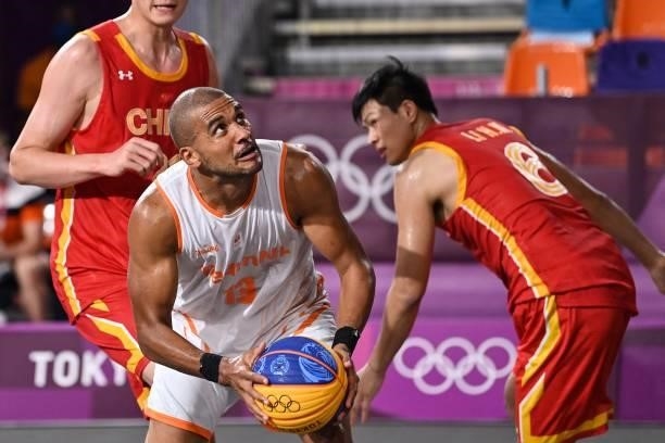 Netherlands' Dimeo Van Der Horst prepares to jump during the men's first round 3x3 basketball match between Netherlands and China at the Aomi Urban...