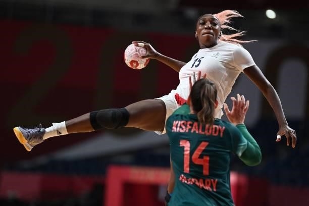 France's left back Kalidiatou Niakate jumps to shoot during the women's preliminary round group B handball match between Hungary and France of the...