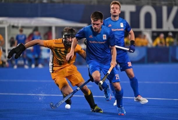 South Africa's Austin Charles Smith and Netherlands' Thierry Brinkman vie for the ball during their men's pool B match of the Tokyo 2020 Olympic...