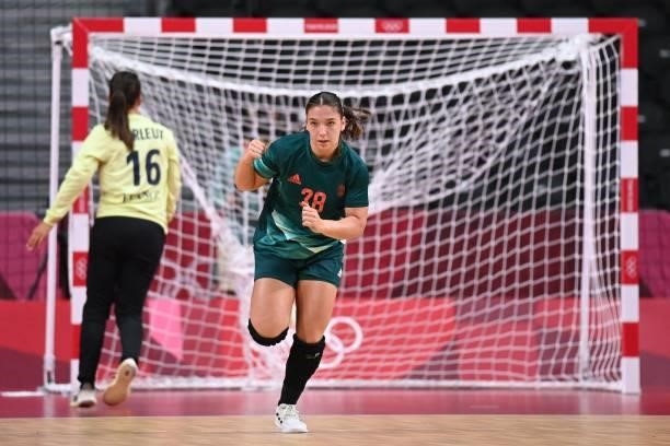 Hungary's centre back Petra Vamos celebrates after scoring during the women's preliminary round group B handball match between Hungary and France of...