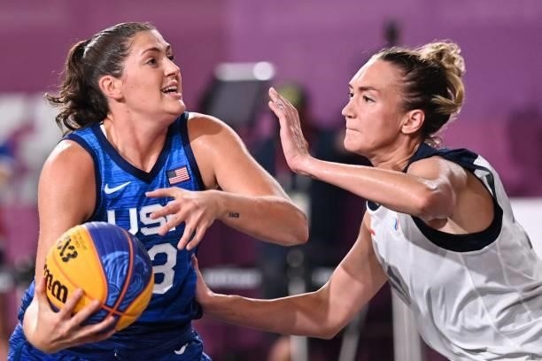 S Stefanie Dolson fights for the ball with Russia's Anastasiia Logunova during the women's first round 3x3 basketball match between Russia and US at...