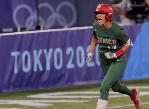 Mexico's Anissa Urtez runs on the base celebrating her two run homer during the fifth inning of the Tokyo 2020 Olympic Games softball opening round...