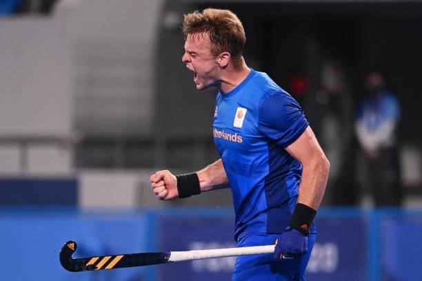 Netherlands' Mink Alphons Louis Van Der Weerden celebrates after scoring a penalty against South Africa during their men's pool B match of the Tokyo...