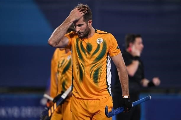 South Africa's Austin Charles Smith reacts during the men's pool B match of the Tokyo 2020 Olympic Games field hockey competition against...