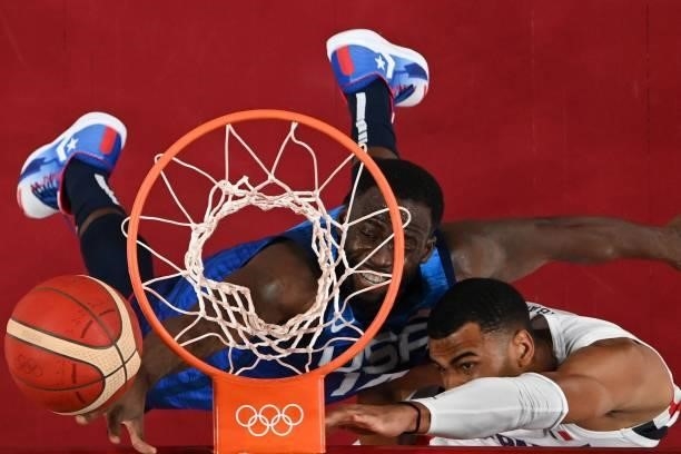 S Draymond Jamal Green fights for the ball with France's Timothe Luwawu Kongbo during the men's preliminary round group A basketball match between...