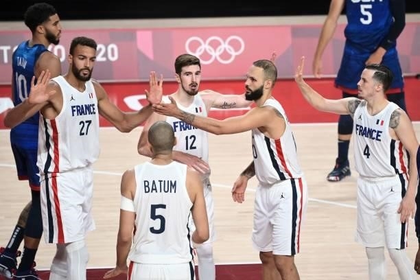 France's Rudy Gobert celebrates a play with teammates during the men's preliminary round group A basketball match between France and USA during the...