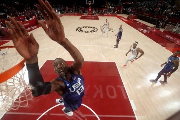 S Edrice Femi Adebayo jumps for the ball in the men's preliminary round group A basketball match between France and USA during the Tokyo 2020 Olympic...
