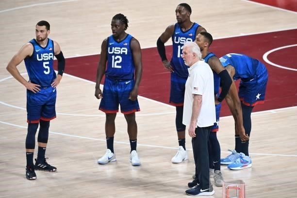 S coach Gregg Popovich talks to his players during a time out in the men's preliminary round group A basketball match between France and USA during...