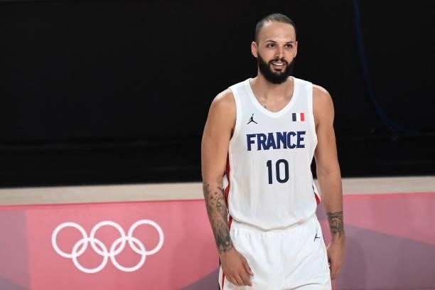 France's Evan Fournier looks on during the men's preliminary round group A basketball match between France and USA during the Tokyo 2020 Olympic...