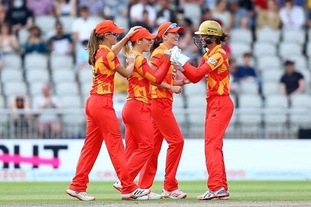 Phoebe Franklin of Birmingham Phoenix celebrates with team mates after catching Lizelle Lee of Manchester Originals during The Hundred match between...