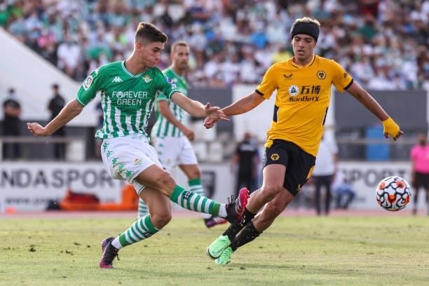 Marchena of Real Betis and Raul Jimenez of Wolverhampton Wanderes FC during the pre-season friendly match between Real Betis and Wolverhampton at La...