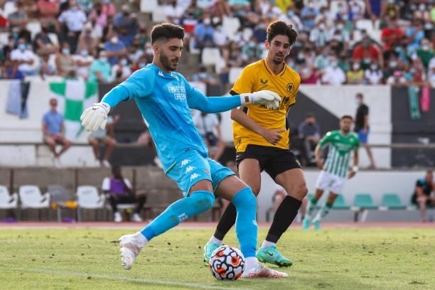 Rui Silva of Real Betis and Francisco Trincao of Wolverhampton Wanderes FC during the pre-season friendly match between Real Betis and Wolverhampton...