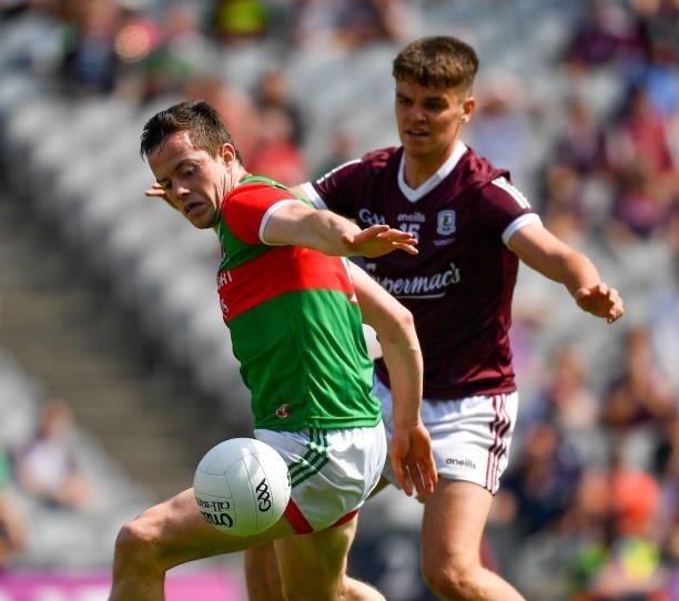 Dublin , Ireland - 25 July 2021; Stephen Coen of Mayo in action against Paul Kelly of Galway during the Connacht GAA Senior Football Championship...