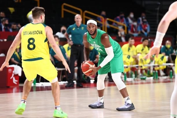 Josh Okogie of the Nigeria Men's National Team looks to pass the ball against the Australia Men's National Team during the 2020 Tokyo Olympics on...