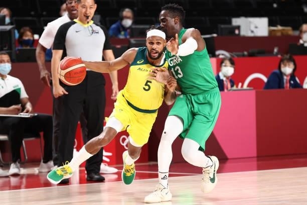 Patty Mills of the Australia Men's National Team drives to the basket against the Nigeria Men's National Team during the 2020 Tokyo Olympics on July...