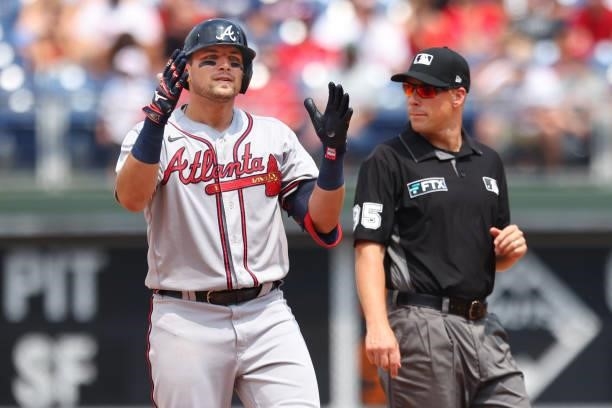 Austin Riley of the Atlanta Braves gestures after hitting a double against the Philadelphia Phillies during the fourth inning of a game at Citizens...