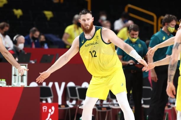 Aron Baynes of the Australia Men's National Team high fives his teammates during the 2020 Tokyo Olympics on July 25, 2021 at Saitama Super Arena in...