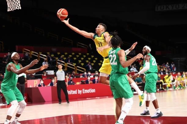Dante Exum of the Australia Men's National Team drives to the basket against the Nigeria Men's National Team during the 2020 Tokyo Olympics on July...