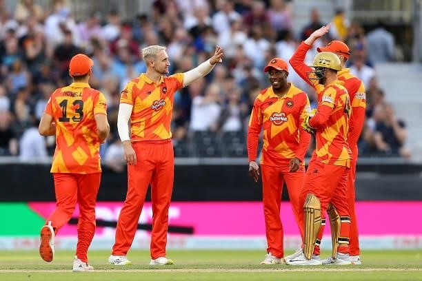 Liam Livingstone of Birmingham Phoenix celebrates with team mates after dismissing Jos Buttler of Manchester Originals during The Hundred match...