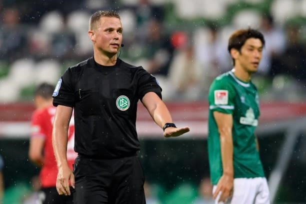 Referee Dr. Robert Kampka gestures during the Second Bundesliga match between SV Werder Bremen and Hannover 96 at Wohninvest Weserstadion on July 24,...